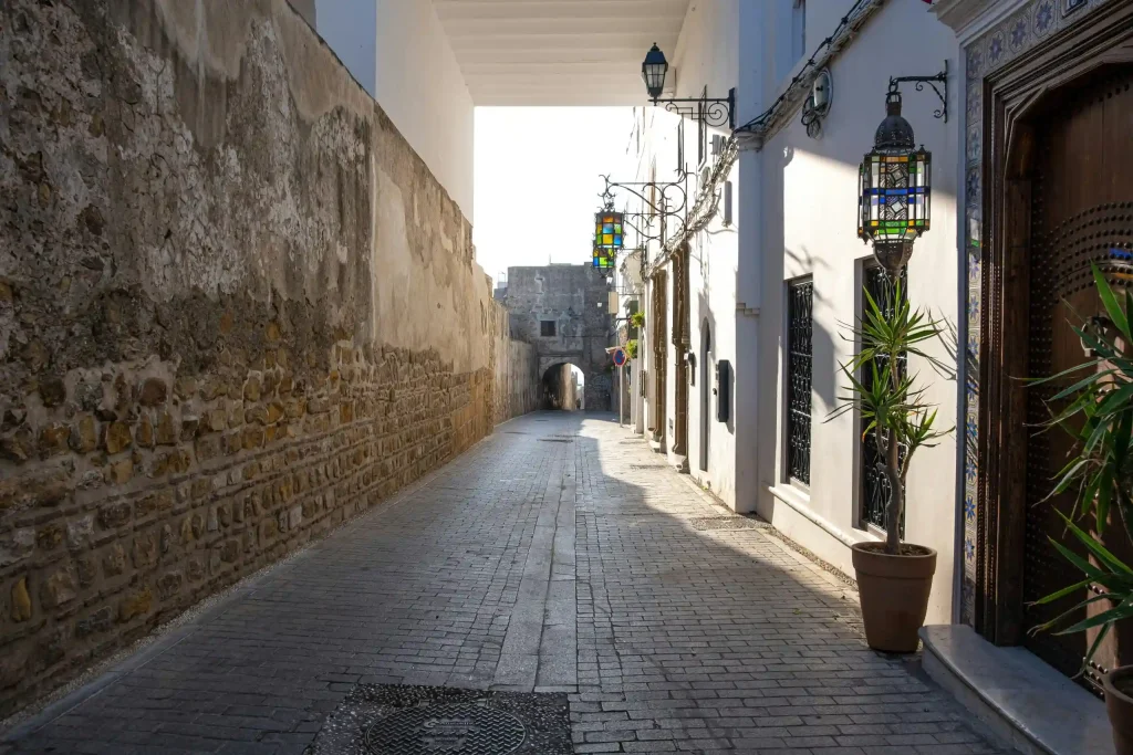 Historic street in Tangier Medina, Morocco, near traditional homes and real estate in the old city